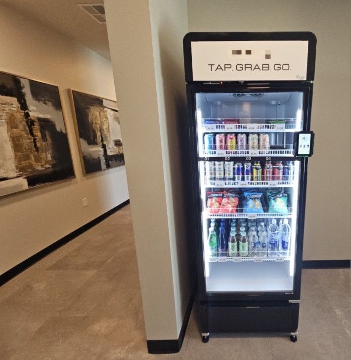 Modern Tap. Grab. Go. smart cooler installed in a Las Vegas office hallway